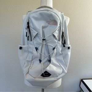 the north face jester backpack in cream/rose gold